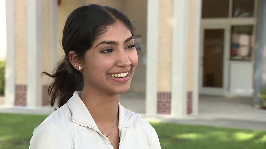  Senior Susmita Gudla standing in front of the community clinic she volunteers at