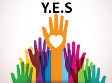  YES with multicolored hands raised